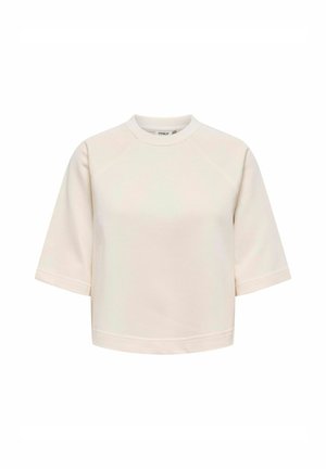 Sweatshirt court couleur crème avec des manches courtes et un col rond, présenté sur un fond blanc.