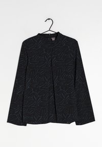 Chemise noire à manches longues avec un motif de feuilles bleu foncé, dotée d'un col haut et d'une coupe droite, réalisée dans un tissu lisse et léger.