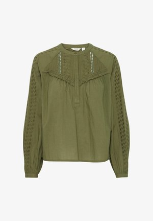 Oliiviroheline pikkade varrukatega pluus, millel on volangiga kaelus, tekstureeritud esiosa ja broderi detailid varrukatel. Nupukinnitus kaela juures.