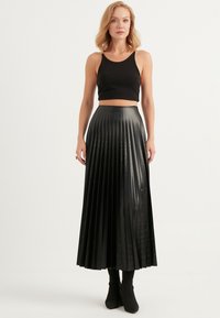 Herita Plooirok - black