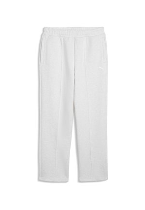 Pantaloni della tuta bianchi in pile con vita elasticizzata, tasche laterali e piccolo logo Puma sulla coscia sinistra.