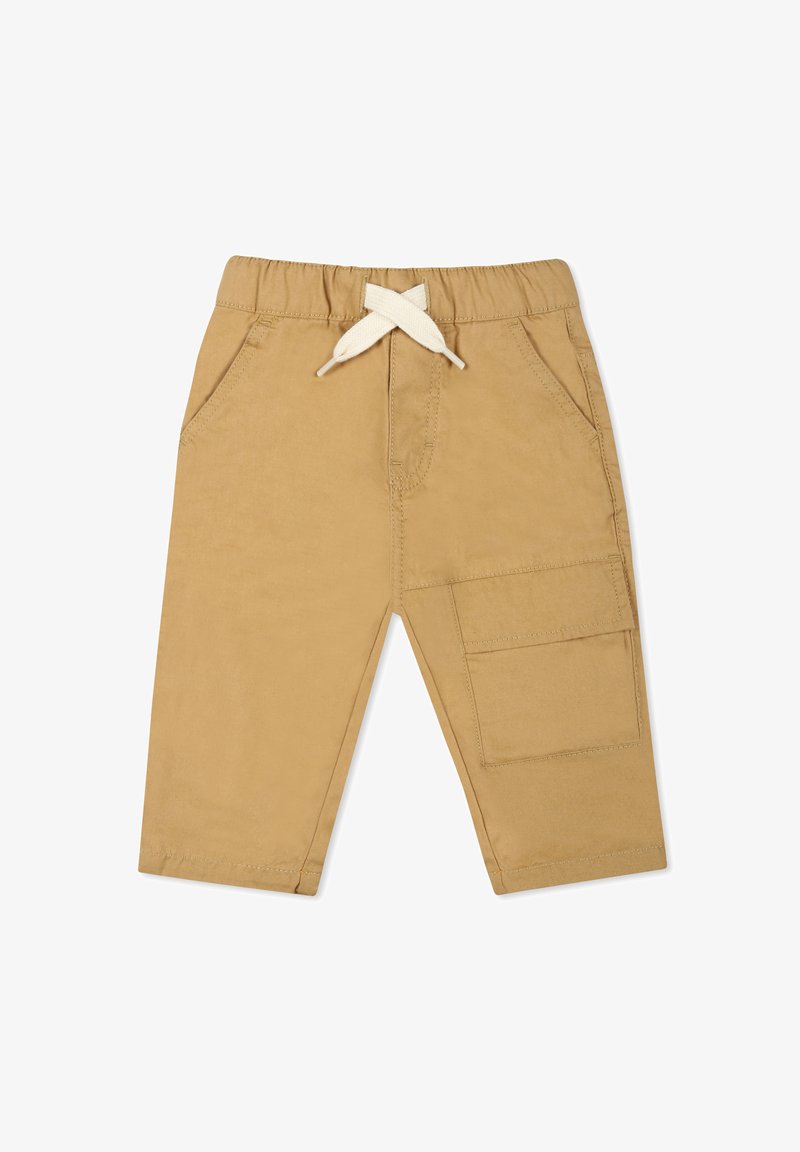 Pantaloni cargo color sabbia con vita elasticizzata, cordino bianco e tasche laterali. Presentano una grande tasca cargo sulla gamba destra.