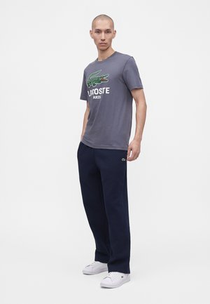 Lacoste, UNISEX - Παντελόνι φόρμας - navy blue