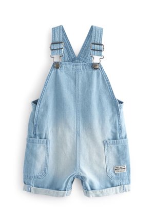 Salopette en denim bleu clair pour tout-petit, avec ourlets retroussés, bretelles réglables, deux poches latérales et une petite étiquette de marque sur la poche droite.