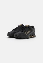 nike reax 8 tr black gold