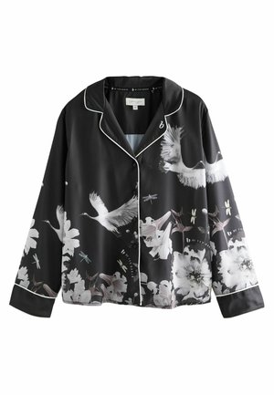 Musta silkki pyjama-paita valkoisilla tikkauksilla, jossa on kukka- ja kurkiprintti. Pitkät hihat, napitus edessä ja rento istuvuus.
