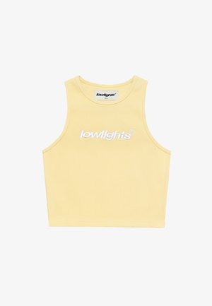 Geltona raštuota trumpa viršutinė dalis su apvaliu kaklu ir balta siuvinėta "lowlights" logo krūtinėje. Pagaminta iš minkštos medžiagos.