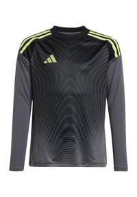 T-shirt de sport à manches longues en noir et gris, avec un motif géométrique, un col rond et trois rayures vertes sur chaque épaule.
