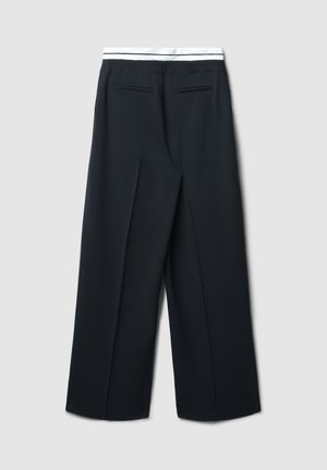 Pantalons à jambes larges en tissu bleu marine foncé avec une texture lisse, dotés d'une taille élastique blanche et de deux poches arrière.