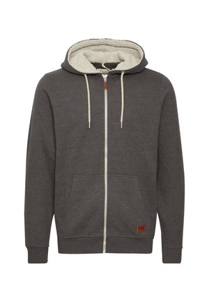 Šedá mikina na zip s krémovou fleece podšívkou, dvěma předními kapsami, nastavitelnou kapucí se šňůrkou a hnědým koženým logem na dolním pravém rohu.