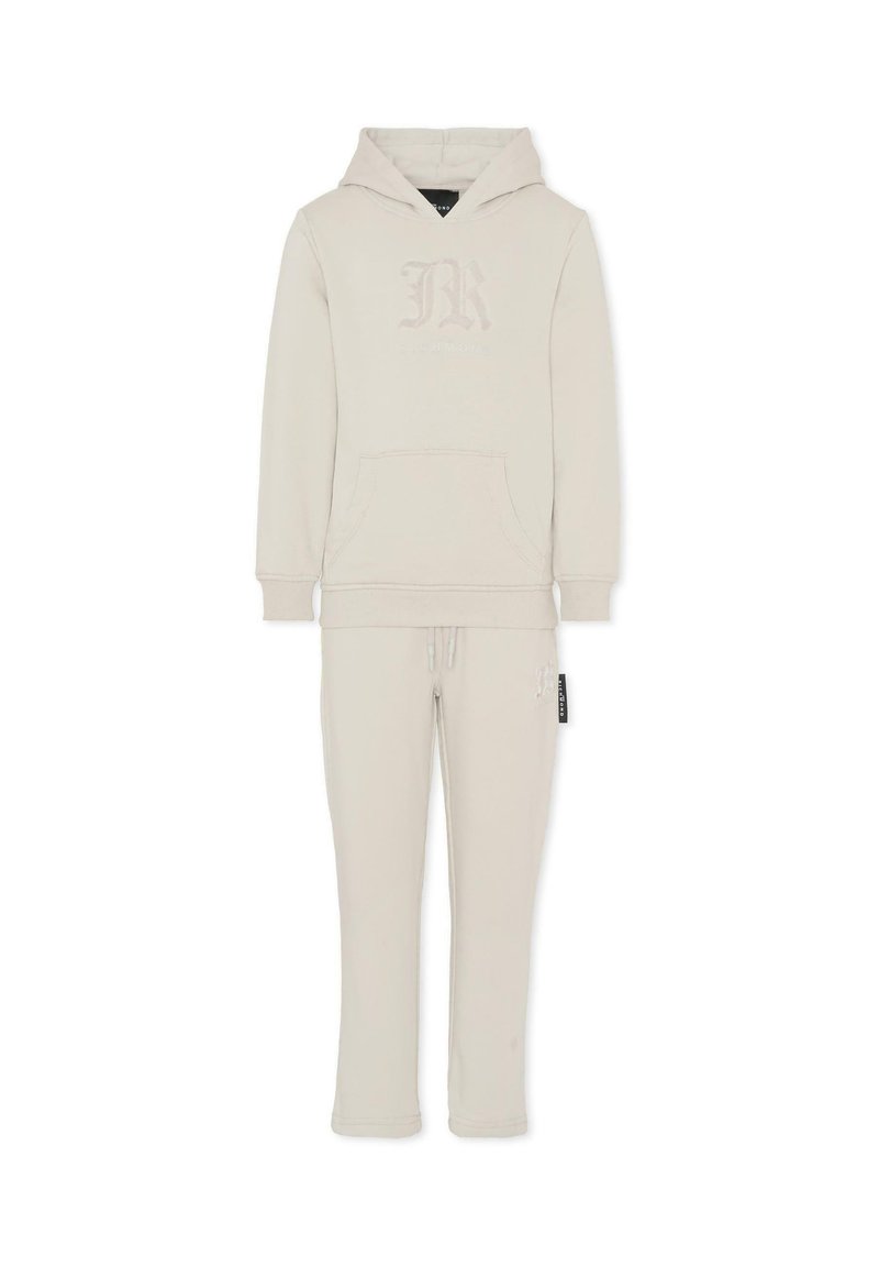 Completo di felpa e pantaloni della tuta in beige chiaro. La felpa presenta una tasca frontale e un logo, con polsini e orlo a costine. Tessuto morbido.