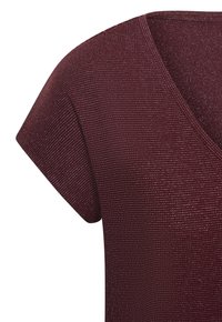 Burgundy short-sleeve top with a V-neck, made of textured fabric featuring a subtle shimmer and thin, vertical ribbing design.