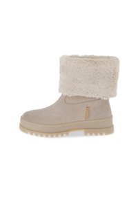 Botas de tobillo beige con un suave puño de piel, hechas de ante, con una parte superior texturizada, suela de goma gruesa y costura a lo largo de los bordes.