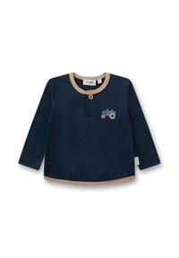 Marineblaue Langarmbluse mit beigem Besatz und Knopfleiste. Mit einem gestickten blauen Traktordesign auf der linken Brust. Aus weichem Baumwollmaterial.