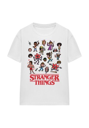 White cotton t-shirt featuring various cartoon characters from "Stranger Things" printed in colorful detail above the text "STRANGER THINGS" in red.