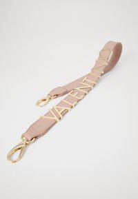 Pink leather strap featuring gold-tone hardware with "VALENTINO" lettering, designed for bags or accessories, with smooth texture and accents.