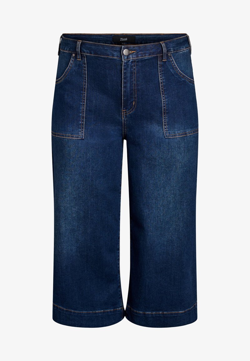 Mørkeblå denim culottes har høj talje, to frontlommer, synlige sømme og et bredbenet design, der slutter under knæet.