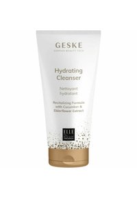 Witte plastic tube met gouden accenten, gelabeld "GESKE Hydrating Cleanser." Bevat komkommer- en vlierbloesemextract; subtiele gespikkelde ontwerpelementen aan de onderkant.