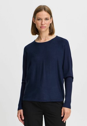 Navy blue long-sleeve shirt in lightweight fabric with a round neckline and relaxed fit. Features fitted cuffs and a smooth texture.
