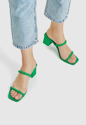 Heeled mules - green