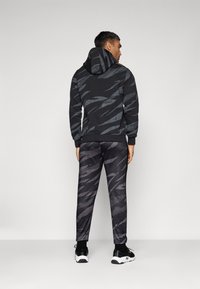 Venum UFC FIGHT WEEK JOGGERS - Dresside alumine osa - urban camo