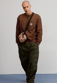 Carhartt WIP JET PANT - Hlačami s stranskimi žepi - cypress rinsed