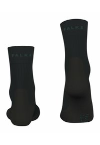 Calcetines tobilleros de canalé en negro que cuentan con refuerzo en el talón y la puntera, con el logo "FALKE" en verde oscuro en el puño y el costado. Textura de punto suave.
