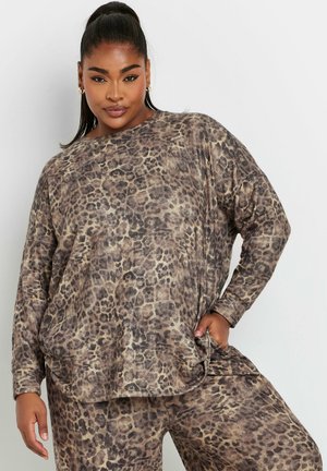 Leopard print, long-sleeve top made from soft fabric. Oversized fit with round neckline and side pockets. Earthy brown and beige tones.