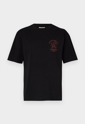 Black cotton t-shirt with short sleeves, round neckline, and a red graphic logo featuring text on the upper left chest area.