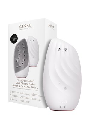 SmartAppGuided hvid sonisk termo ansigtsbørste og ansigtsløfter med opstrammende kugler, vist ved siden af sin mærkede produktæske.