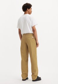 Levi's® - Chinosy