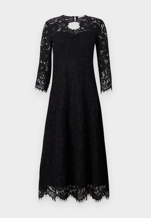 Svart blondekjole med lange ermer, som har en nøkkelhullsutringning og bølgende kant. Blomsterdesign over hele kjolen gir dekorative detaljer.