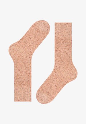 Baumwollsocken in einem sanften Pfirsichton mit meliertem Muster. Enthält ein Crew-Style und ein niedrig geschnittenes Design, das eine verstärkte Zehen- und Fersenpartie aufweist.