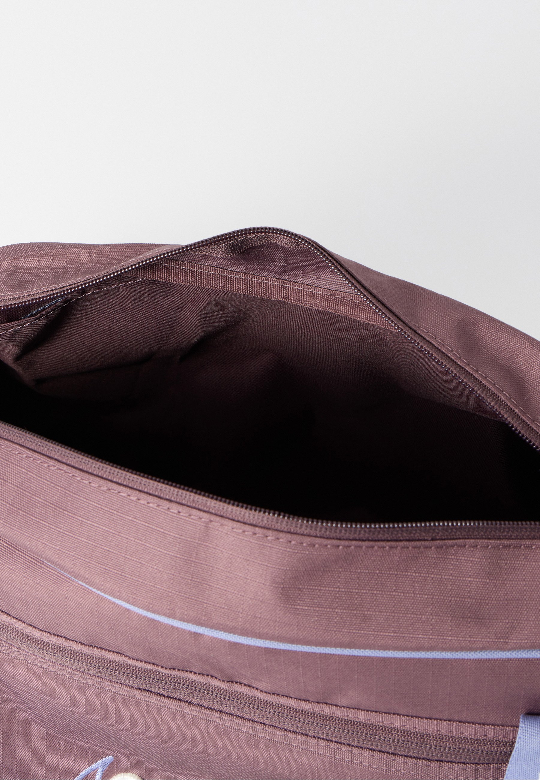 purple nike holdall