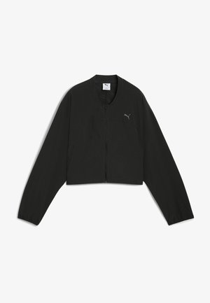 Giacca nera corta con zip, maniche lunghe e scollo rotondo. Presenta un sottile logo grigio nella parte superiore sinistra.