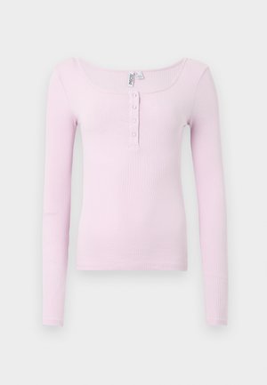 Long-sleeve ribbed top in light pink. Features a scoop neckline and five-button placket at the front, with a fitted shape and smooth texture.