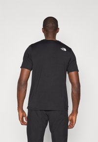 The North Face MOUNTAIN FOUNDATION TEE GRAPHIC - T-Shirt sport - black