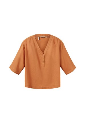 Ruosteenvärinen löysä lyhythihainen pusero, jossa V-aukko ja edessä kaksi nappia, valmistettu kevyestä kankaasta.
