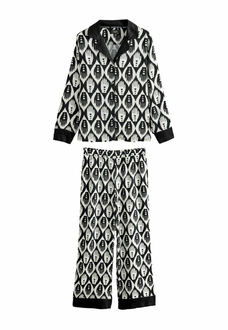 Set de pijamale alb-negru cu un model de mâini, cu mâneci lungi, guler cu tăietură și pantaloni cu talie elastică. Textură a materialului neted.