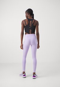 Nike Performance UNIVERSA - Tajice - lilac bloom