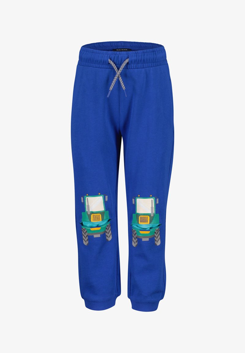Pantalons de survêtement en coton bleu avec un cordon de serrage à la taille et des graphismes de tracteurs sur chaque jambe. Texture douce et coupe légèrement fuselée.