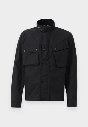 Black jacket made of durable fabric, featuring a high collar, snap buttons, two front pockets, and a straight cut design.