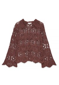 Brown crocheted blouse featuring a collared neckline, button closure, and floral patterns with an open weave. Bell sleeves with scalloped hem.