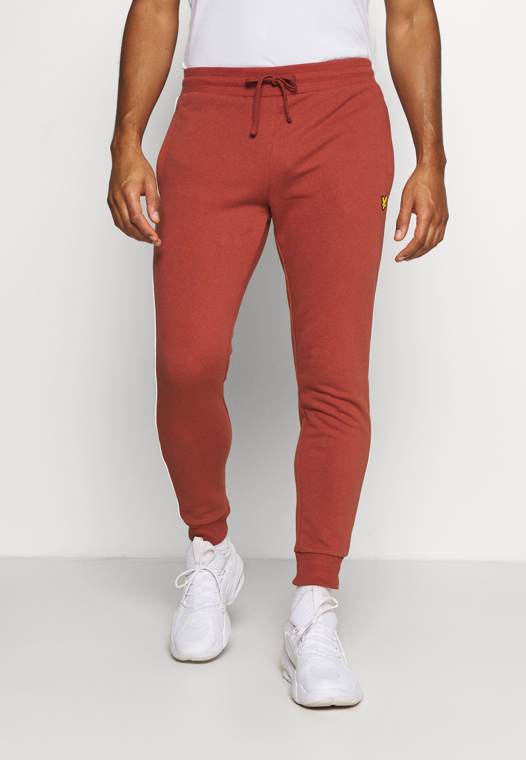 orange tracksuit mens