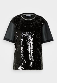 Chemise noire à manches courtes avec sequins noirs brillants sur le devant et manches transparentes, col rond, étiquette DKNY à l'intérieur du col.