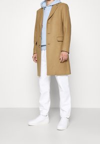 sandro Jersey con capucha - light blue