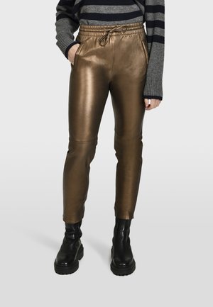 GIFT METAL - Leather trousers - golden beige