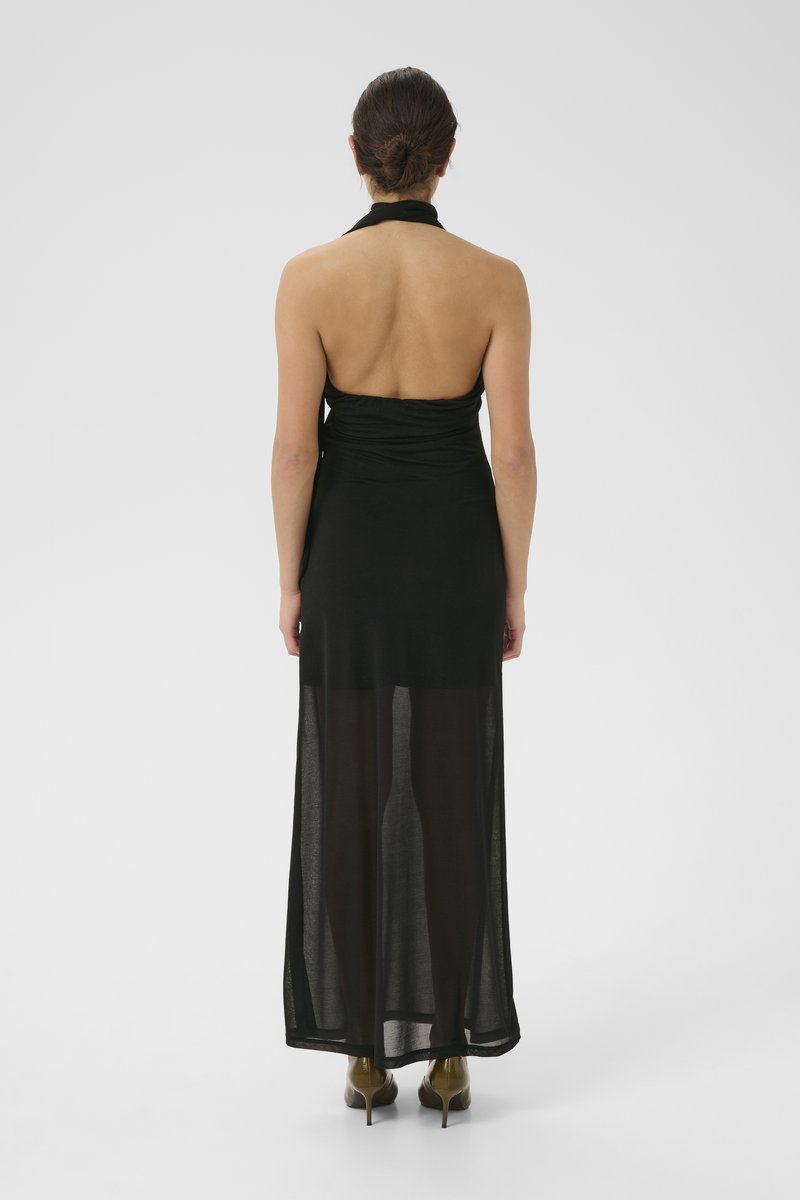 Schwarzes Halsbandkleid mit tailliertem Oberteil und transparentem, fließendem Rock. Verfügt über ein rückenfreies Design, eine glatte Textur und eine lange Länge.