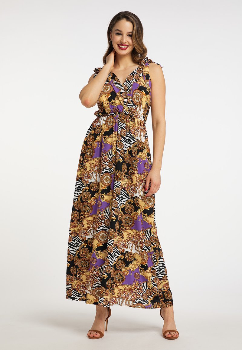 Abito maxi con un motivo colorato e intricato che mescola tonalità dorate, viola e stampe animali. Design a V con spalline arricciate e vita aderente.