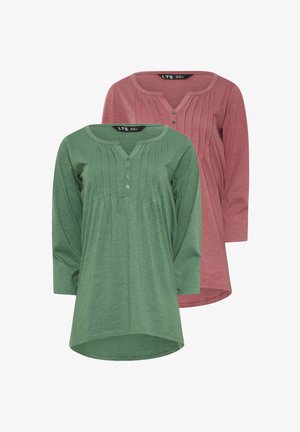 Grüne und rosa Langarmshirts mit rundem Ausschnitt, ausgestattet mit einer Knopfleiste und vertikalen Falten. Weicher, leichter Stoff.